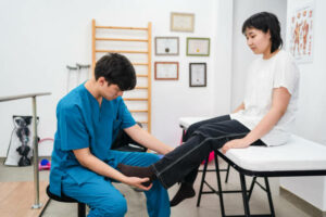 teenager girl going to the doctor with leg pain